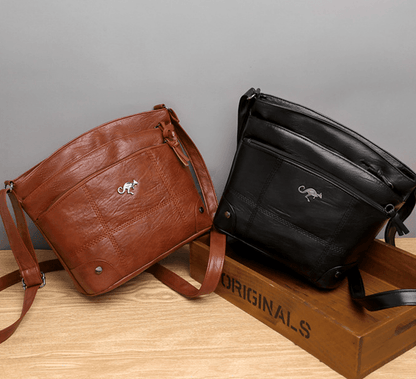 Vintage Leather Shoulder Bag with Adjustable Strap and Pockets